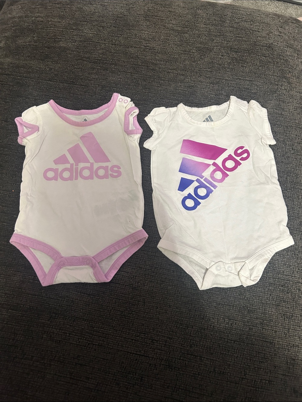adidas White Baby Bodysuits with Pink Trim and Pink-to-Purple Gradient Logo